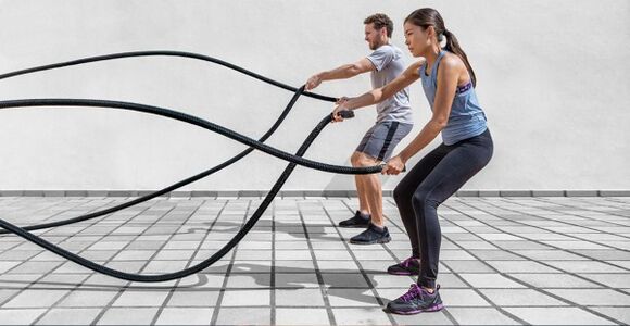 A man and a woman do exercises